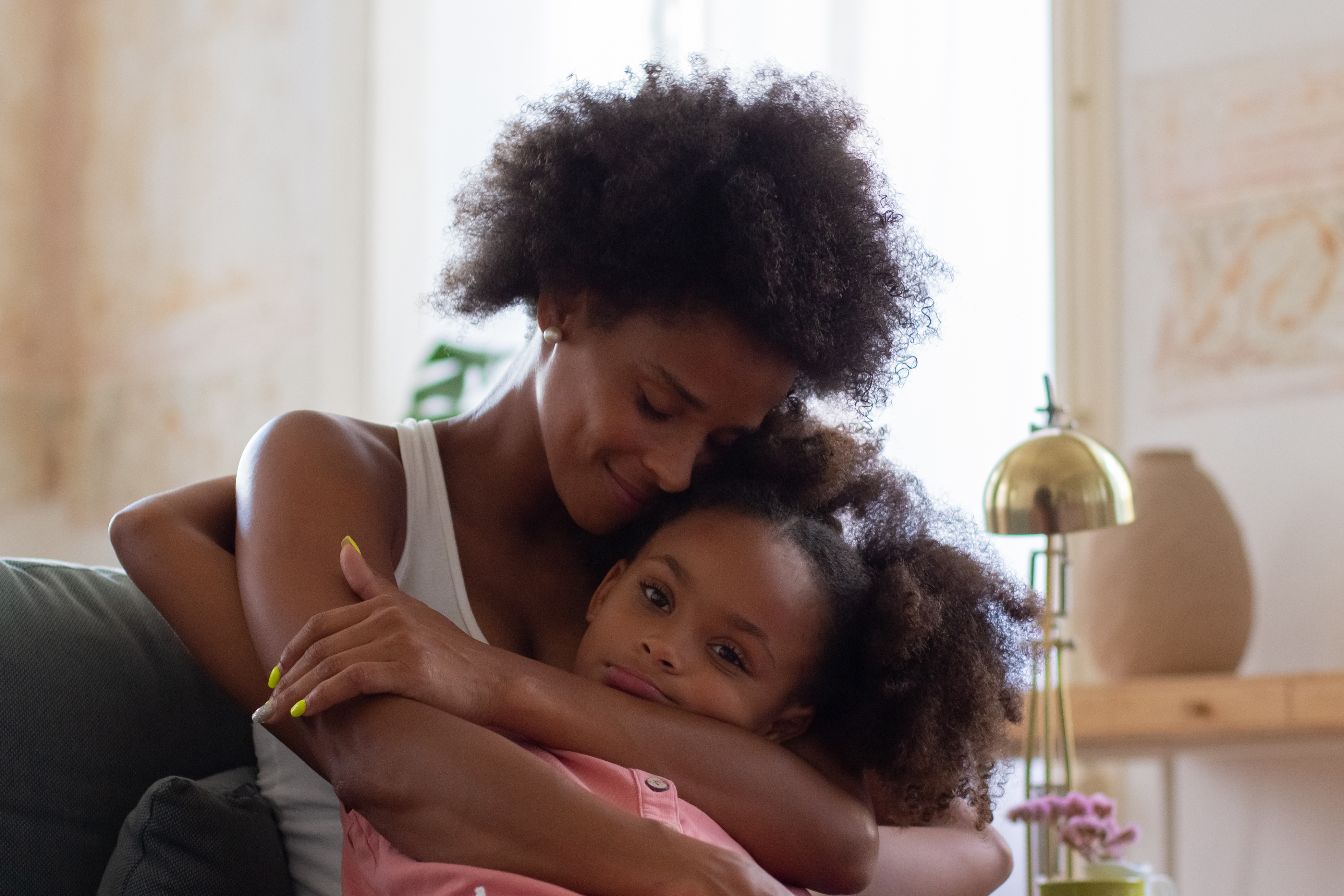 african-american-mother-daughter-hugging-lovingly-woman-girl-casual-clothes-holding-each-other-coach-love-family-bonding-concept-1