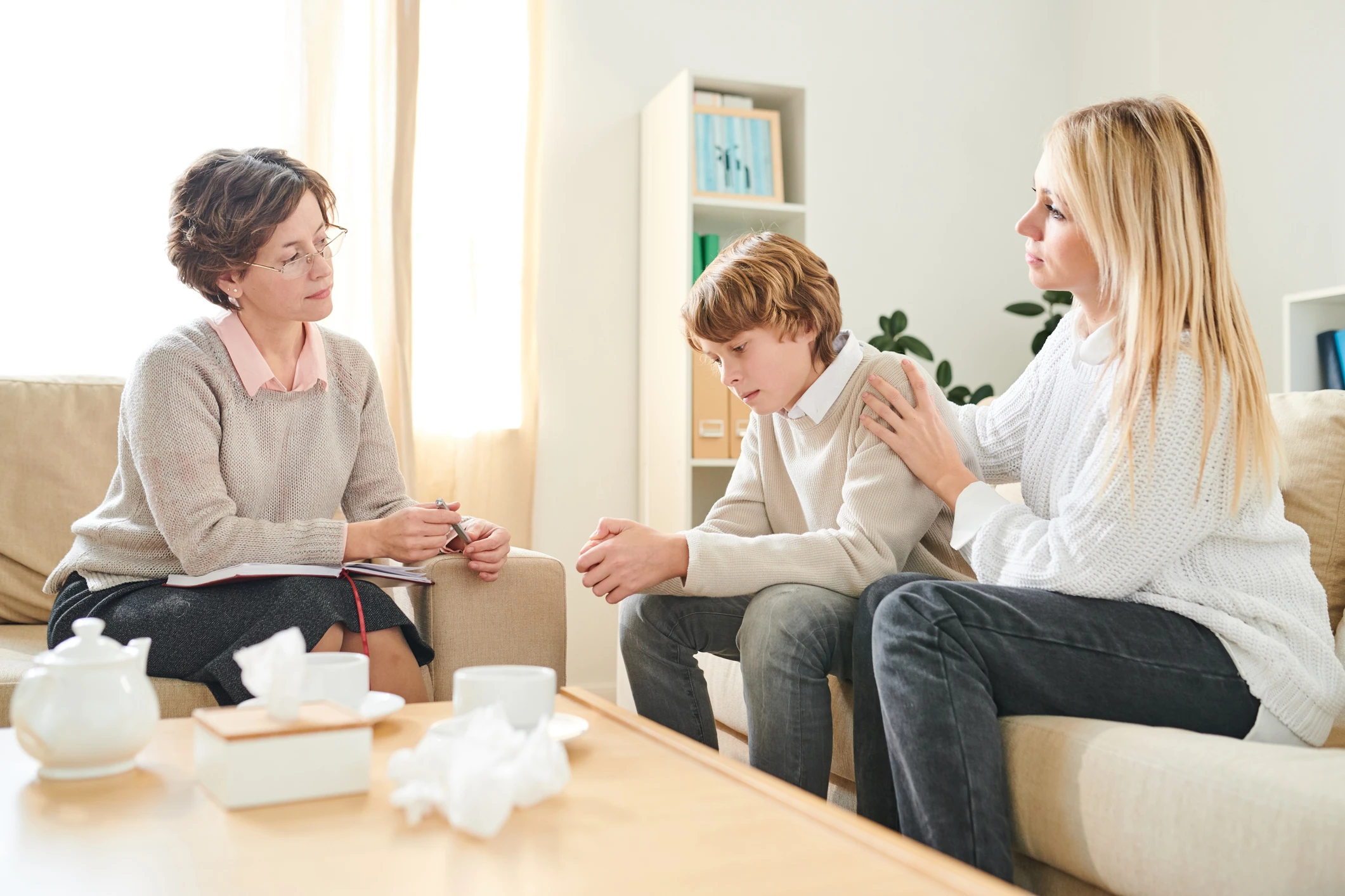 Mother supporting son at therapy - Maryvale